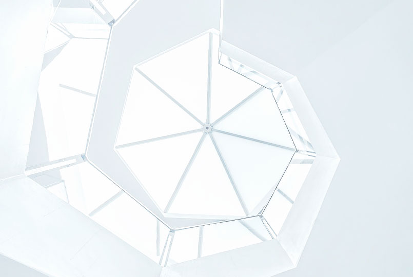 Banner Quem Somos - Fundos de Investimento Kinea Formas geométricas que formam uma escada em caracol. Foto por Joel Filipe.